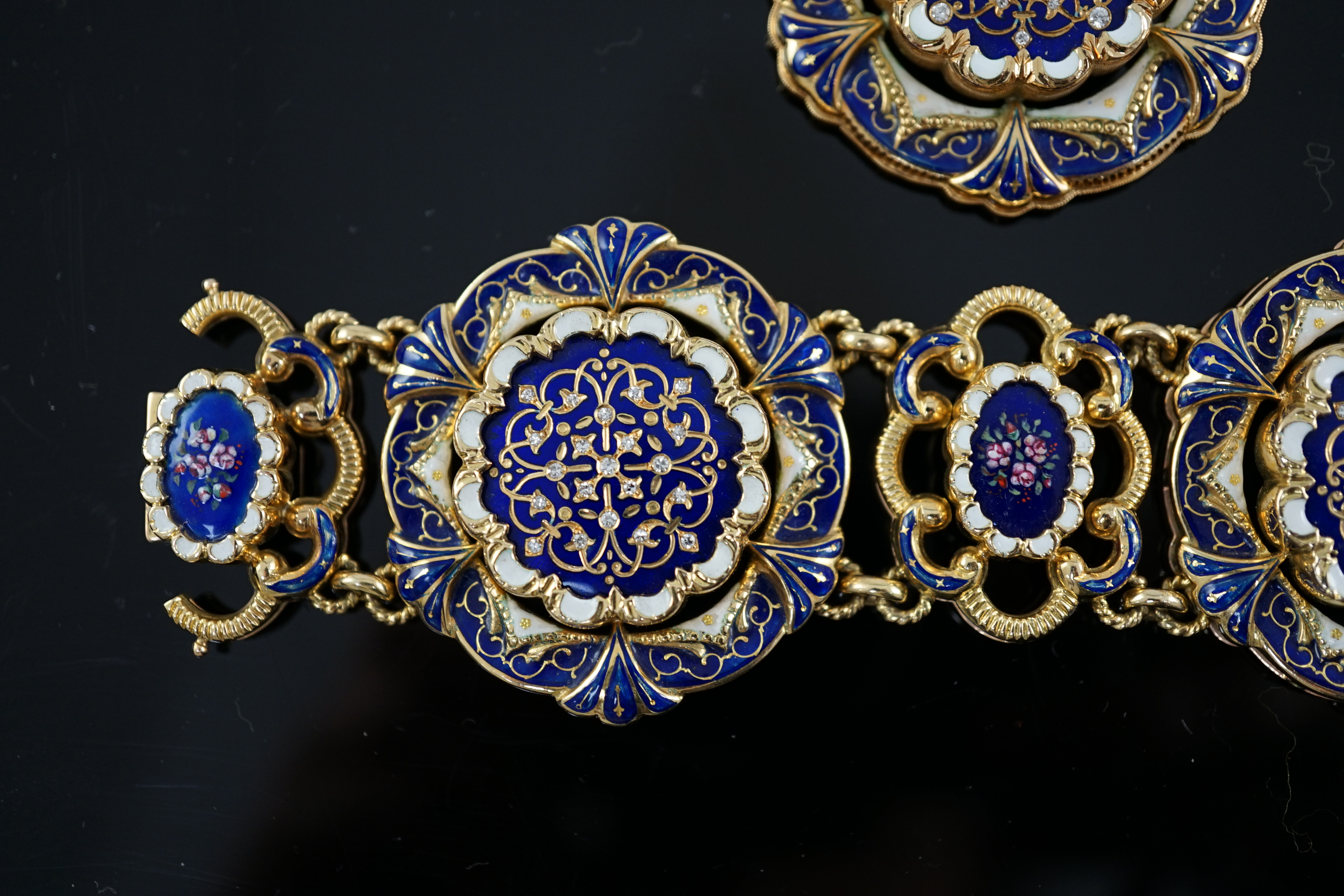 A mid 20th century Swiss 18ct gold and polychrome enamelled suite of jewellery, retailed by E. Meister, Zurich